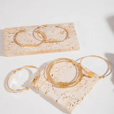 Set di Bracciali Eleganti e Sofisticati con Nodo in Oro