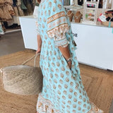 MANA | ABITO MIDI FLOREALE CHIC CON COLLO A V