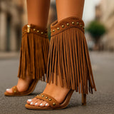 Stivali con tacco in suede con frange
