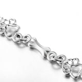 Bracciale con Charms a Forma di Zampa e Osso d'Argento
