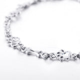 Bracciale con Charms a Forma di Zampa e Osso d'Argento