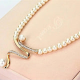 Set collana e orecchini con perle naturali