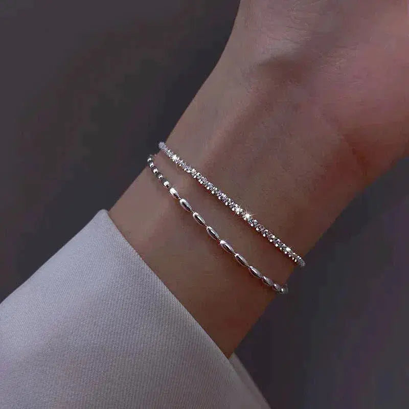 Set di bracciali eleganti in argento con pietre di zirconia
