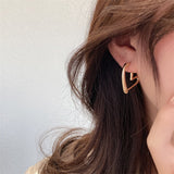 Orecchini Funky a Forma di Cuore in Oro e Argento