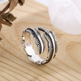 Anello Memoriale Regolabile con Piuma di Un Angelo