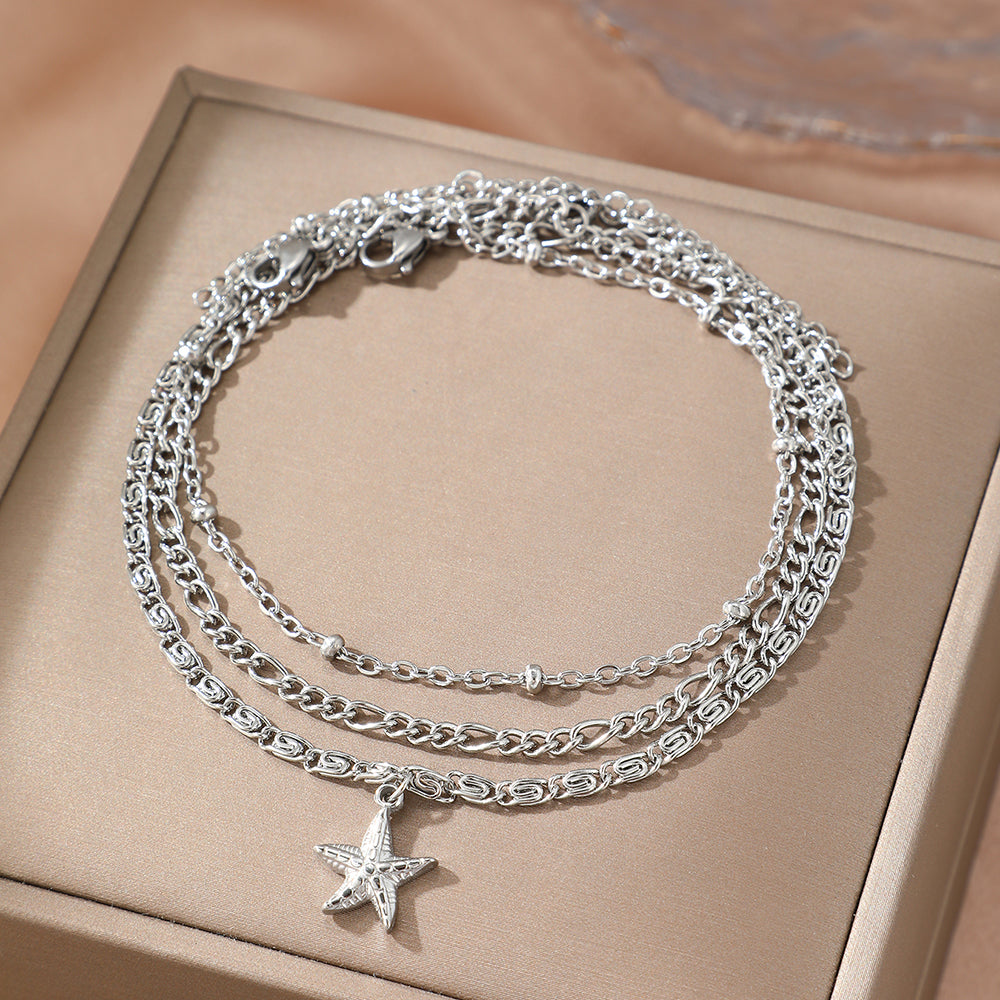 Set di cavigliera con charm a forma di stella marina da 3 pezzi