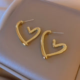 Orecchini Funky a Forma di Cuore in Oro e Argento