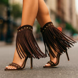 Stivali con tacco in suede con frange