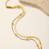 Set di Cavigliere con Motivo a Ossa di Serpente 2pz